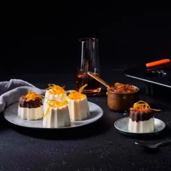 Bandeja molde antiadherente para 12 canelés - Acero al carbono - Le Creuset